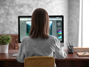 Image of person working on computer