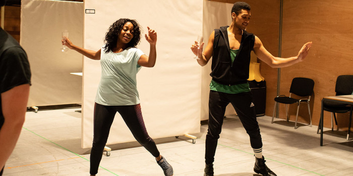 L-R, Aretha Ayeh (Chichi) and Arun Blair-Mangat (Damien) in rehearsals for Leave to Remain. Photo by Helen Maybanks