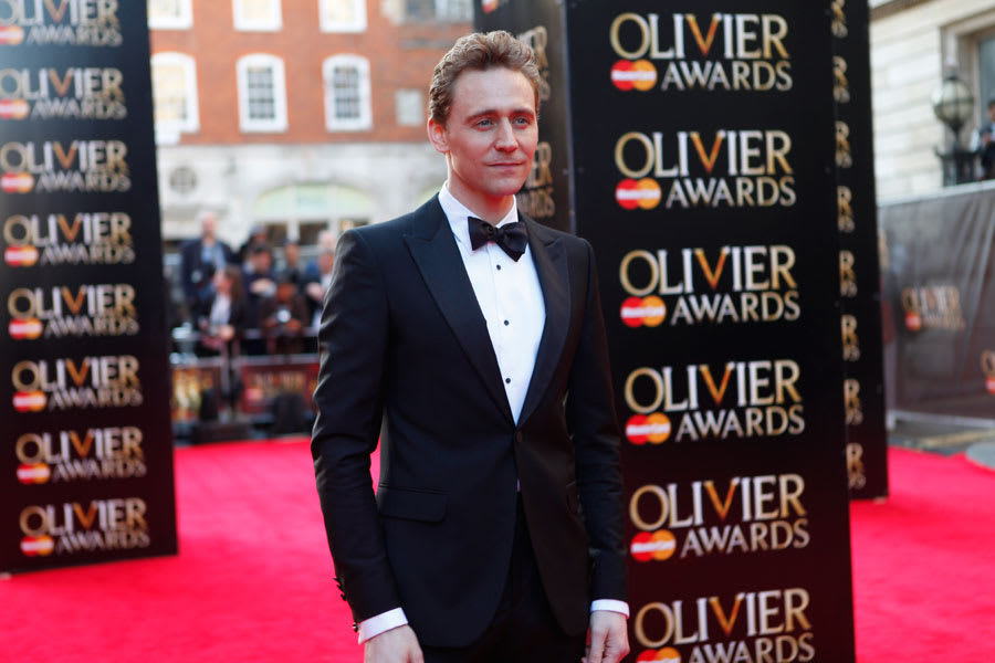 Best Actor nominee Tom Hiddleston walks the red carpet at the Olivier Awards 2014 with MasterCard (Photo: Pamela Raith)