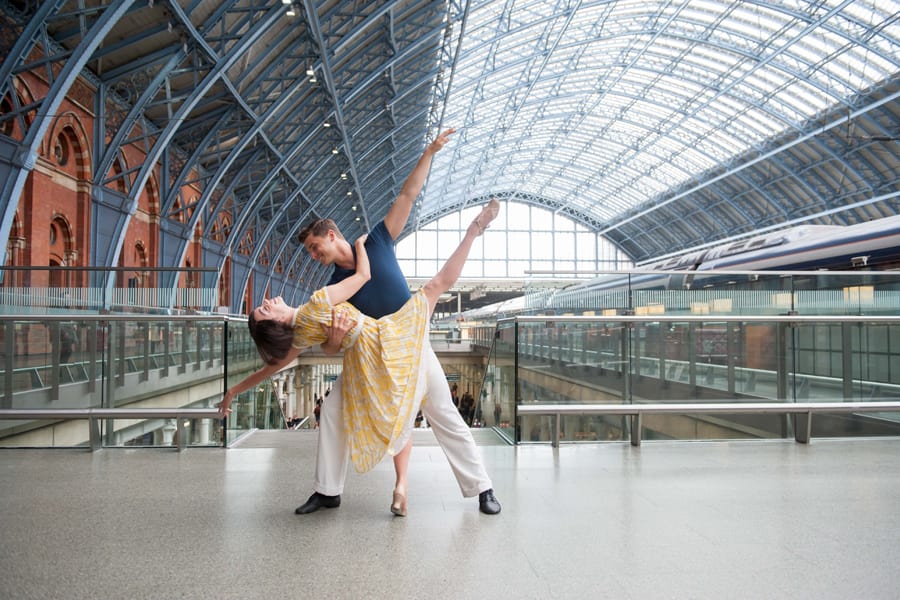 The cast of An American In Paris at St Pancras International station