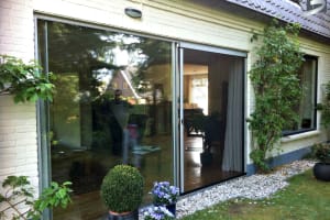 Slimline schuifpui met plissé hordeur 