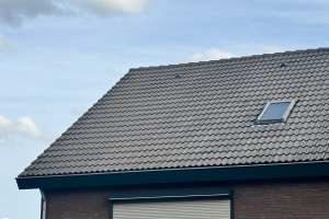 Reiniging beton dakpannen