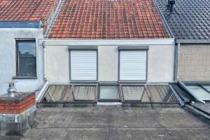 Spuitkurk op buitengevel