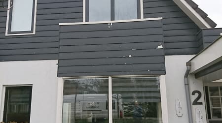 Volledige renovatie woning met nieuwe gevelbekleding en boeidelen