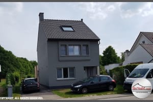 Gevelrenovatie met kurkverf te Grasheide.