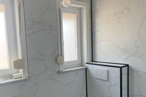 Uitbekleden van badkamer in Dumawall platen