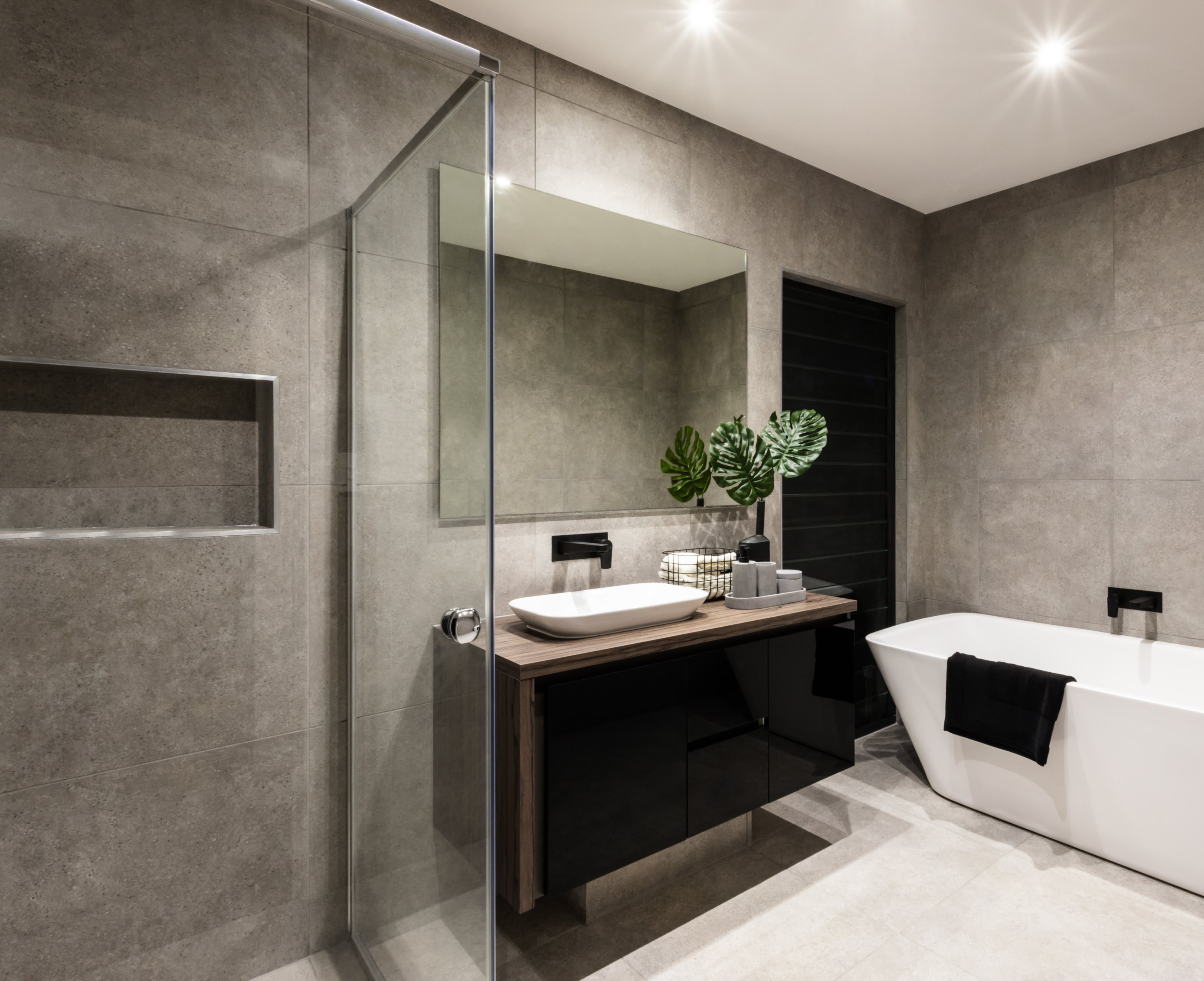 Salle de bain moderne et minimaliste avec des carreaux en béton