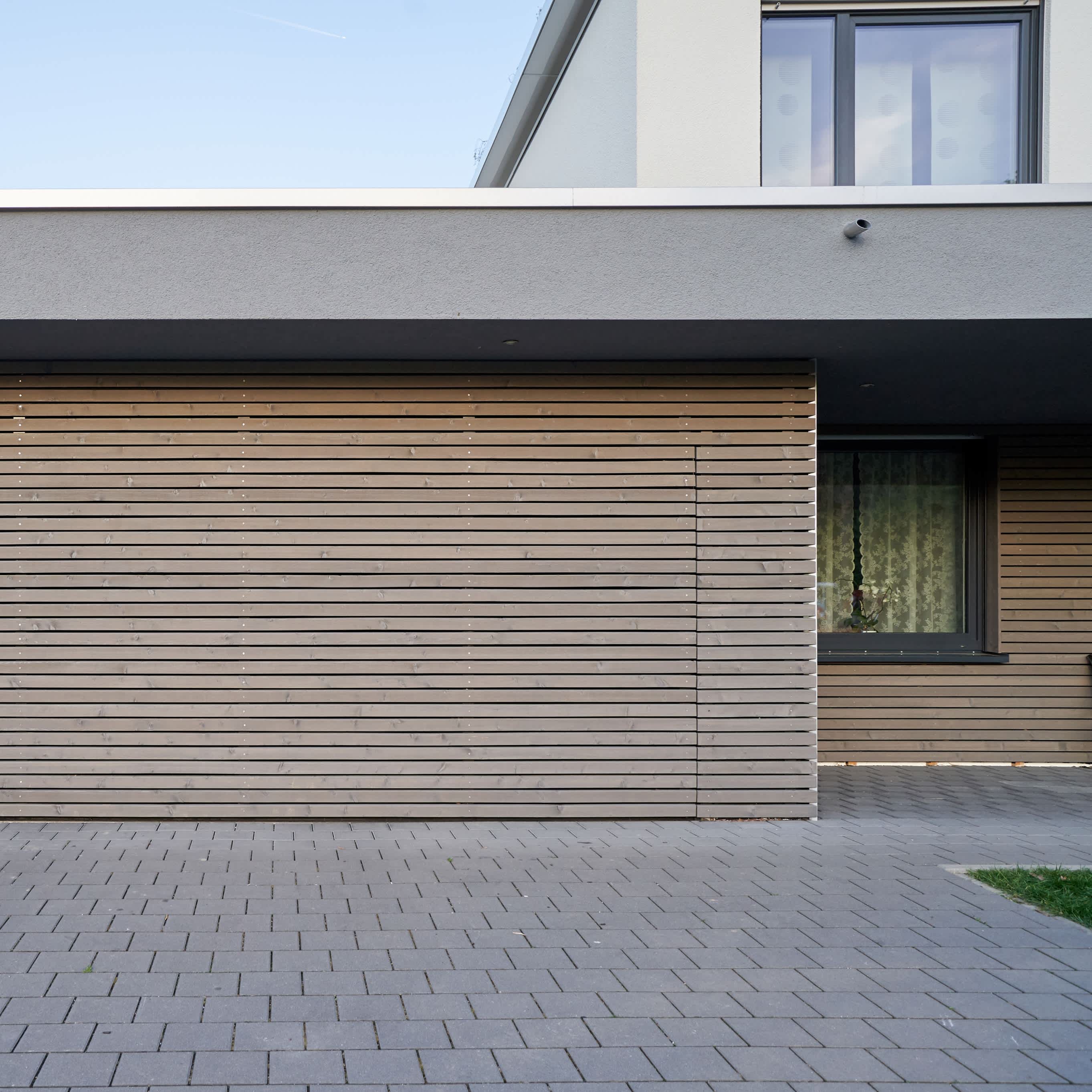 Revêtement de façade en bois et crepi