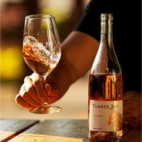 Morgan Craft - Tamber Bey Vineyards Swirling a Glass of Rosé