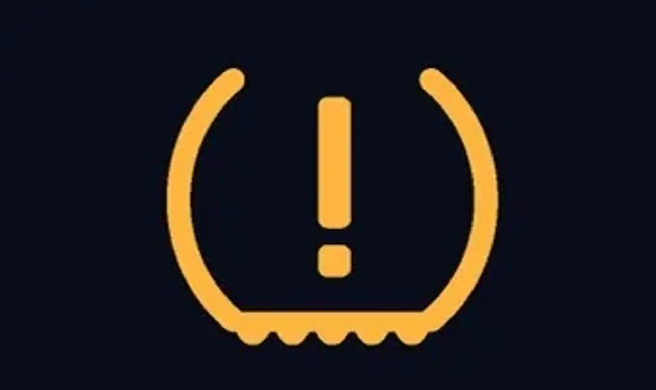 Symbol för Lågt däcktryck