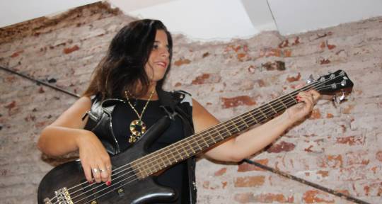 Bass player, Songwriter - Karina Auday