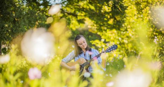 Singer, Songwriter, Guitarist. - Jodie Reid