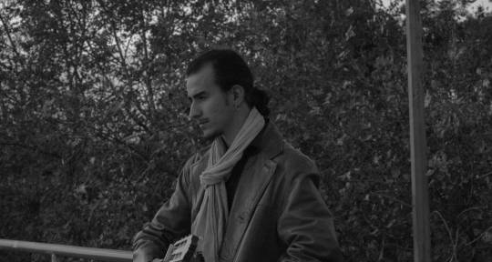 Composer, arranger, guitarist. - Vassilis Kaloudis