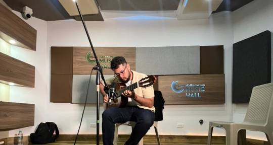 Music Producer. Guitarrist - Julian Pabón
