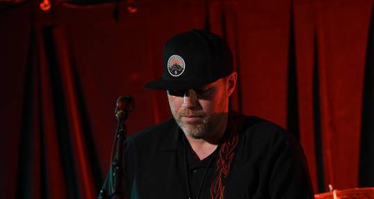 Rhythm guitar and vocal - Tim Slam