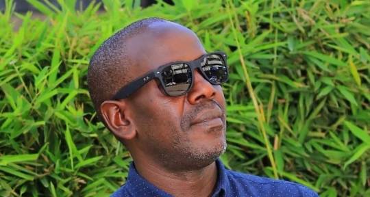Songwriter/Entrepreneur - Enock Change