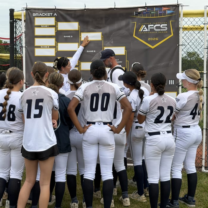 Team huddle at the Tier III bracket board