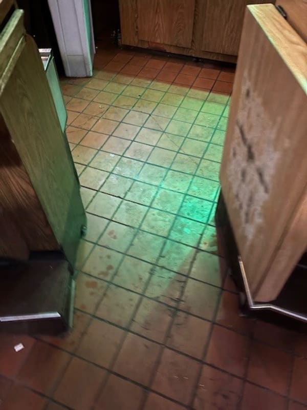 Morgan's Bar floor before machine scrubbing