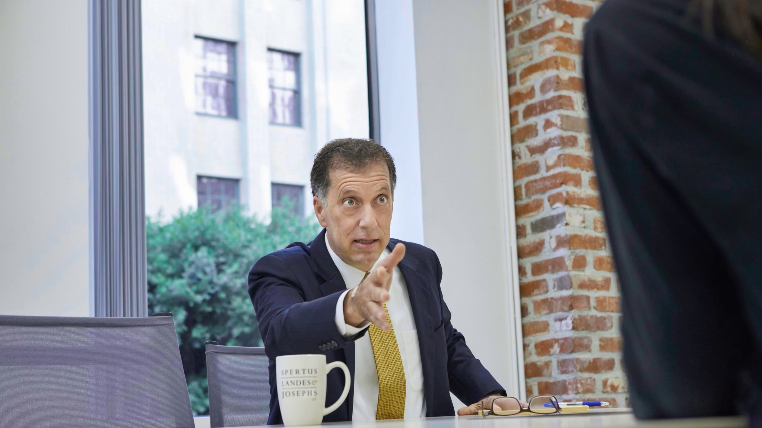 James Spertus talking to a client