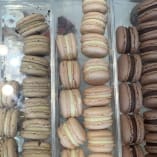 A display case filled with an assortment of macarons at Sandrine French Pastry and Chocolate in Kelowna.