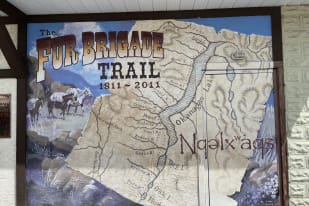 A mural at Summerland depicting the Fur Brigade Trail with a map and pack horses, celebrating the years 1811-2011.
