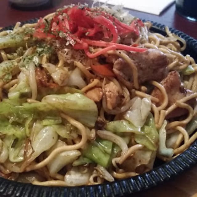 A platter of yakisoba noodles with vegetables and chicken at Mahoroba Japanese Restaurant in Vernon.