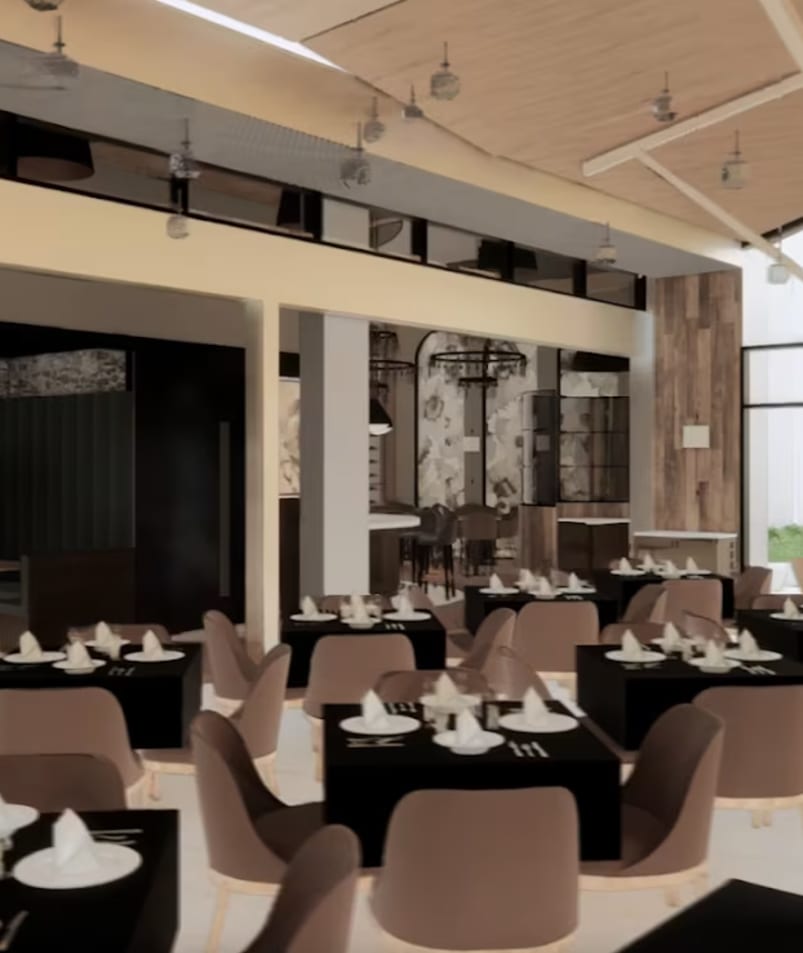 A modern dining area in Erica Jane Restaurant in Kelowna with neatly arranged tables, black tablecloths, and beige chairs, featuring large windows and wooden design elements.