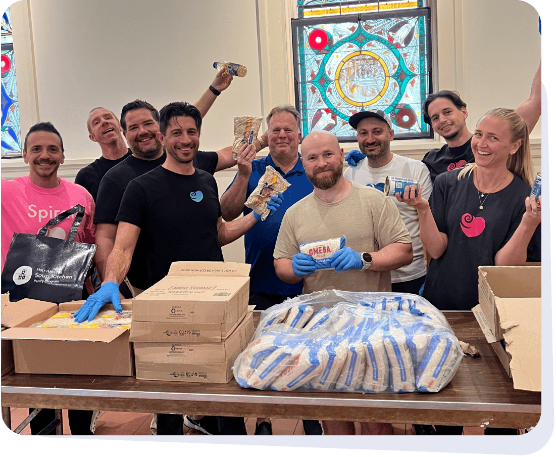 Spiral team packing meals together