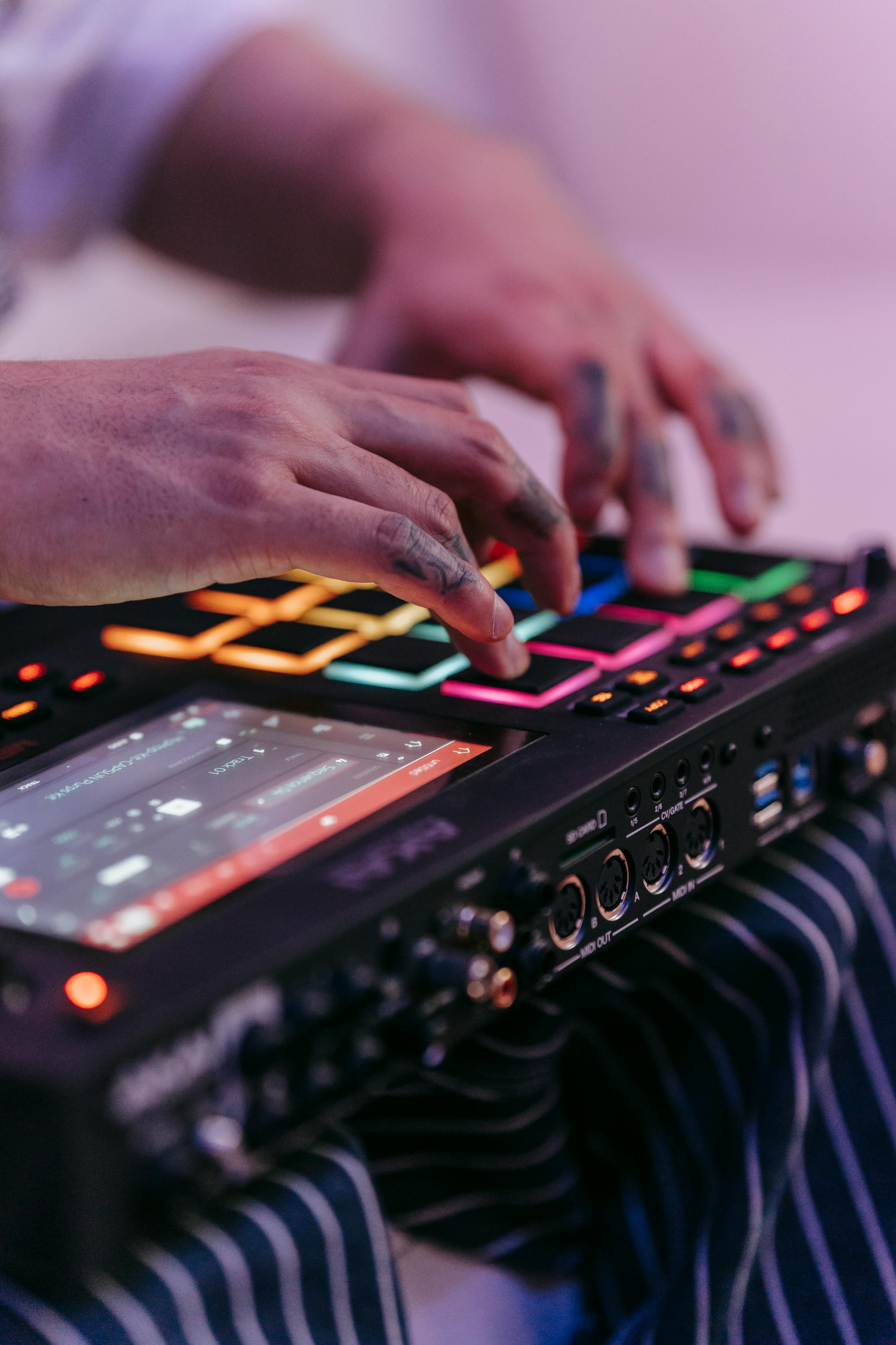 Hands at Drum Machine