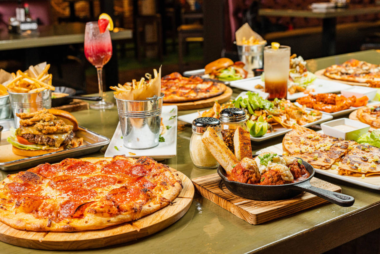Bottle Rockets Bar & Eats - Best Sports Bar Plano TX - Huge 4K TVS