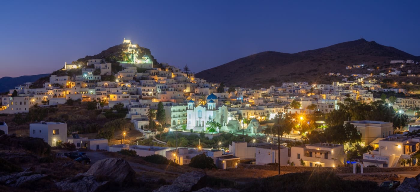 The Chora of Ios at the blue hour, illuminated white houses