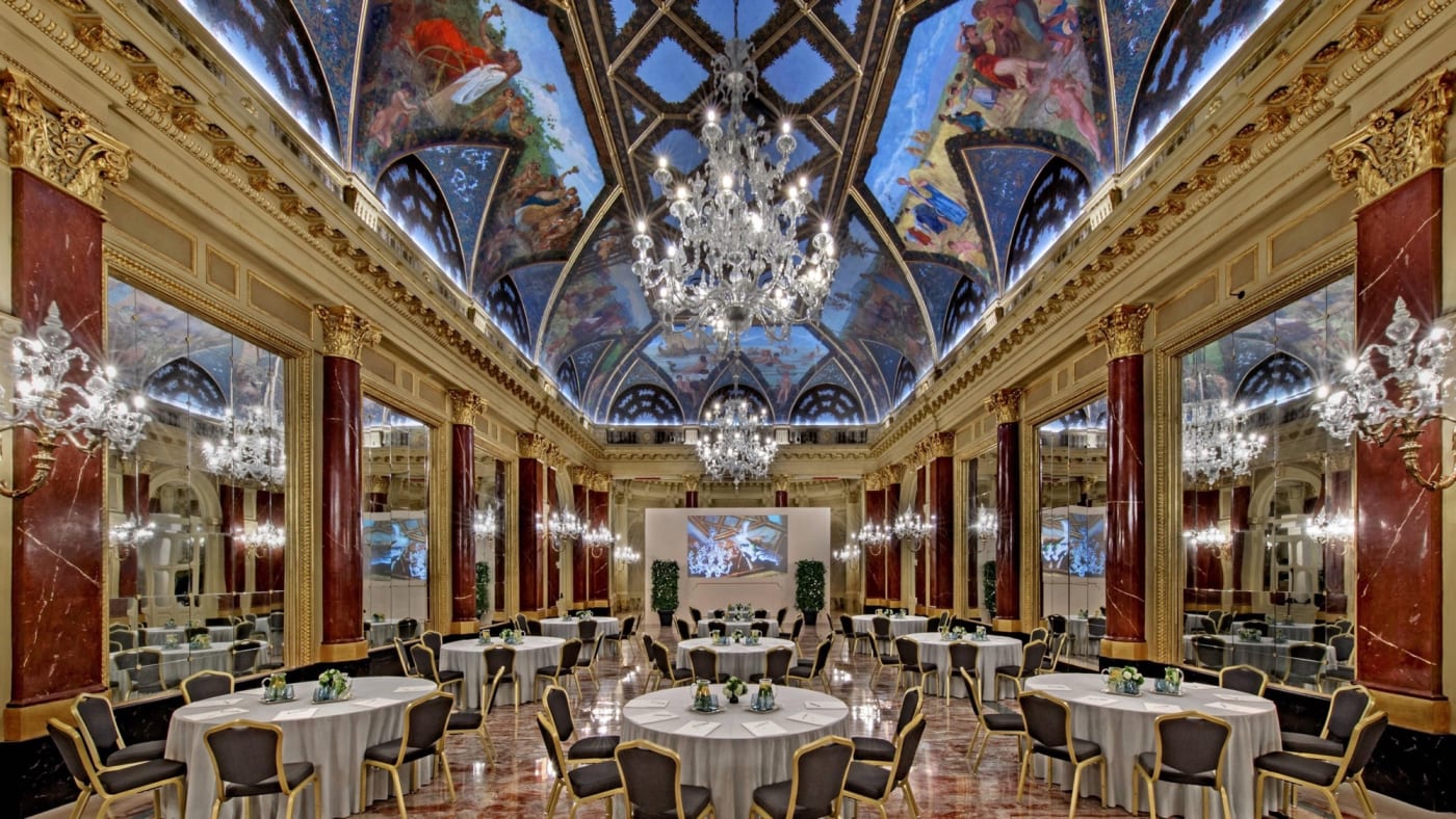 The Ritz ballroom at the St. Regis Rome, painted ceiling and marble columns
