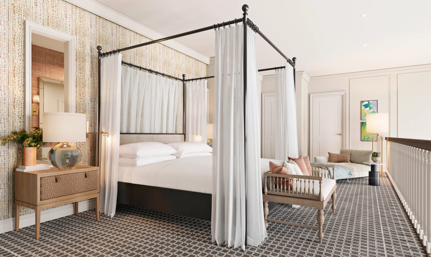 Rendu d'une suite du Fairmont Southampton avec lit à baldaquin