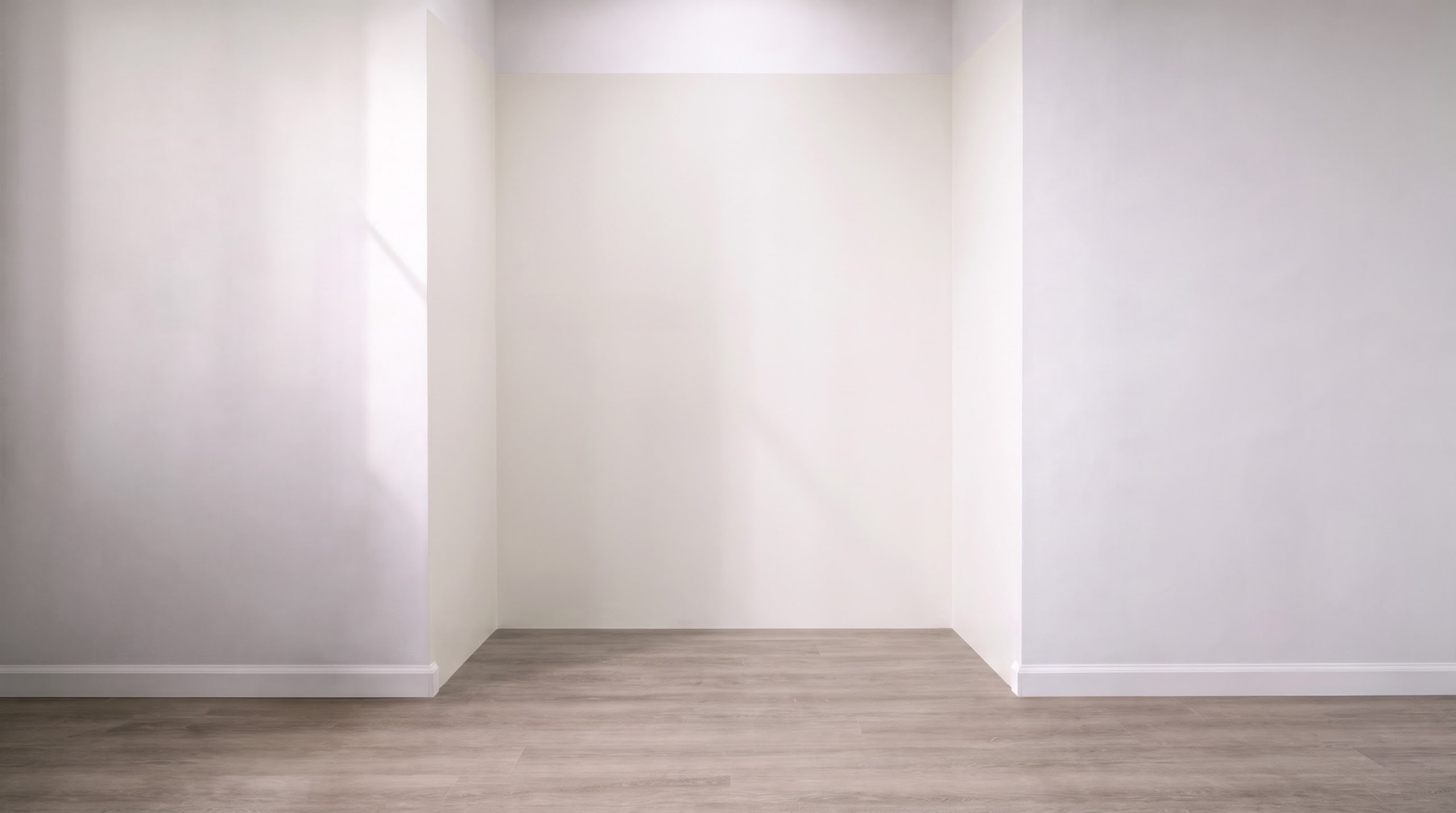Empty bathroom alcove, ready to configure your custom shower