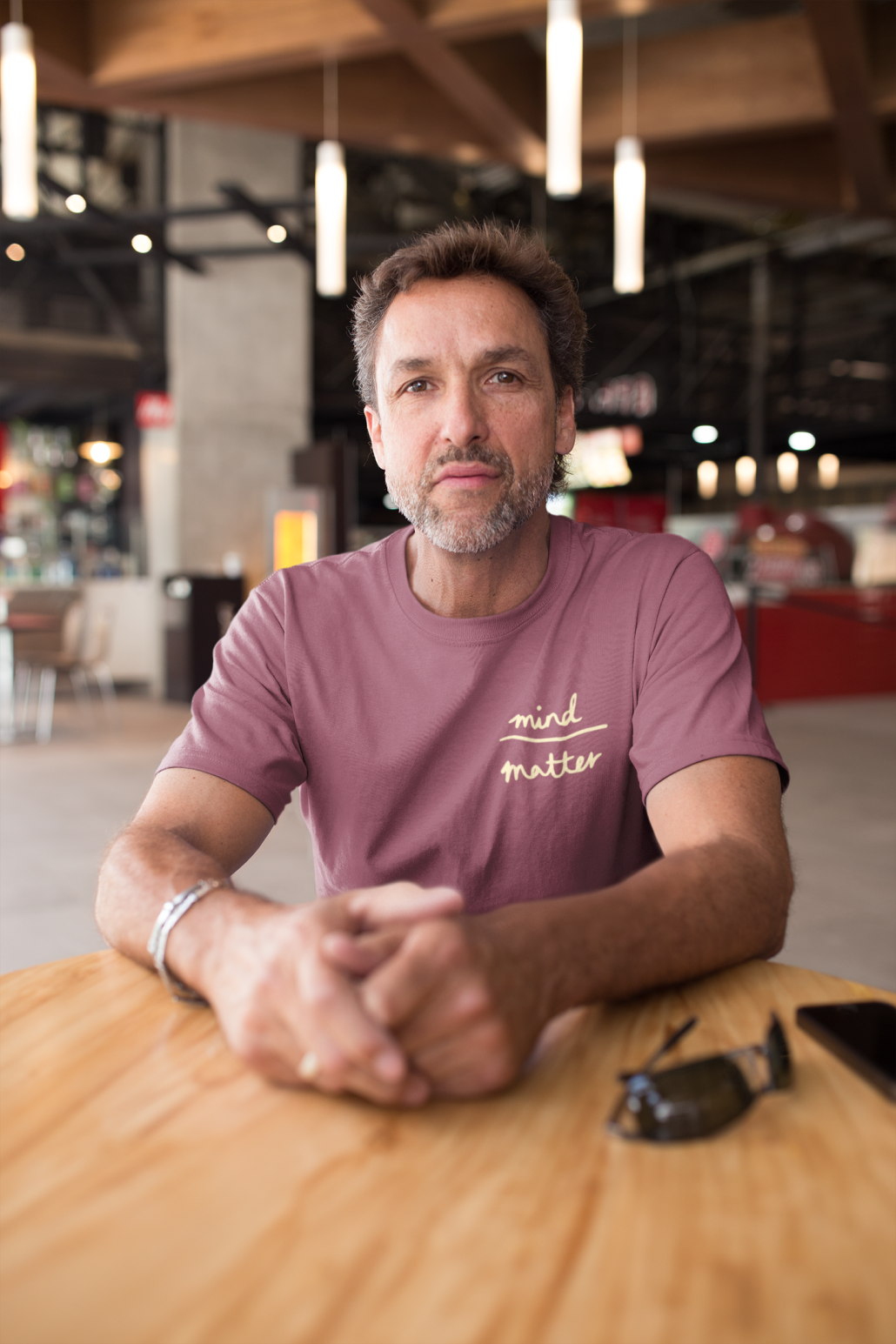 Middle-aged guy wearing a custom t-shirt