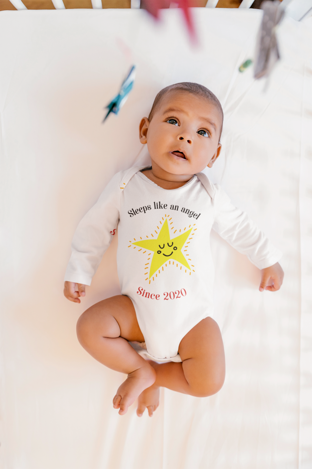 Baby with custom romper suit