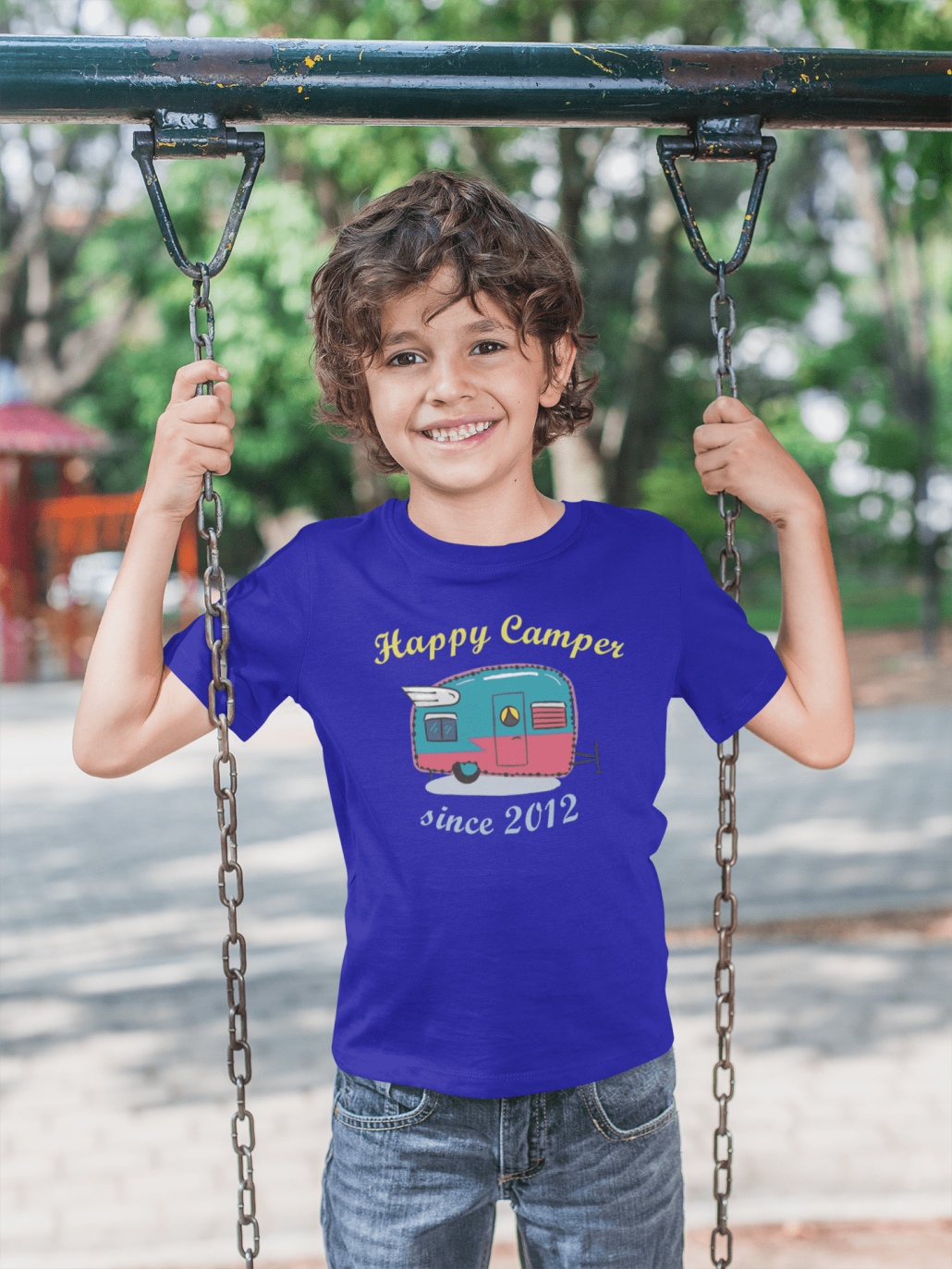 Boy in a swing with custom T-shirt