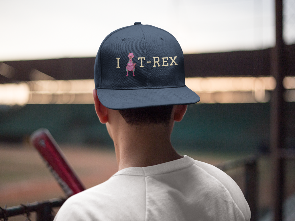 Boy with custom dinosaur baseball hat