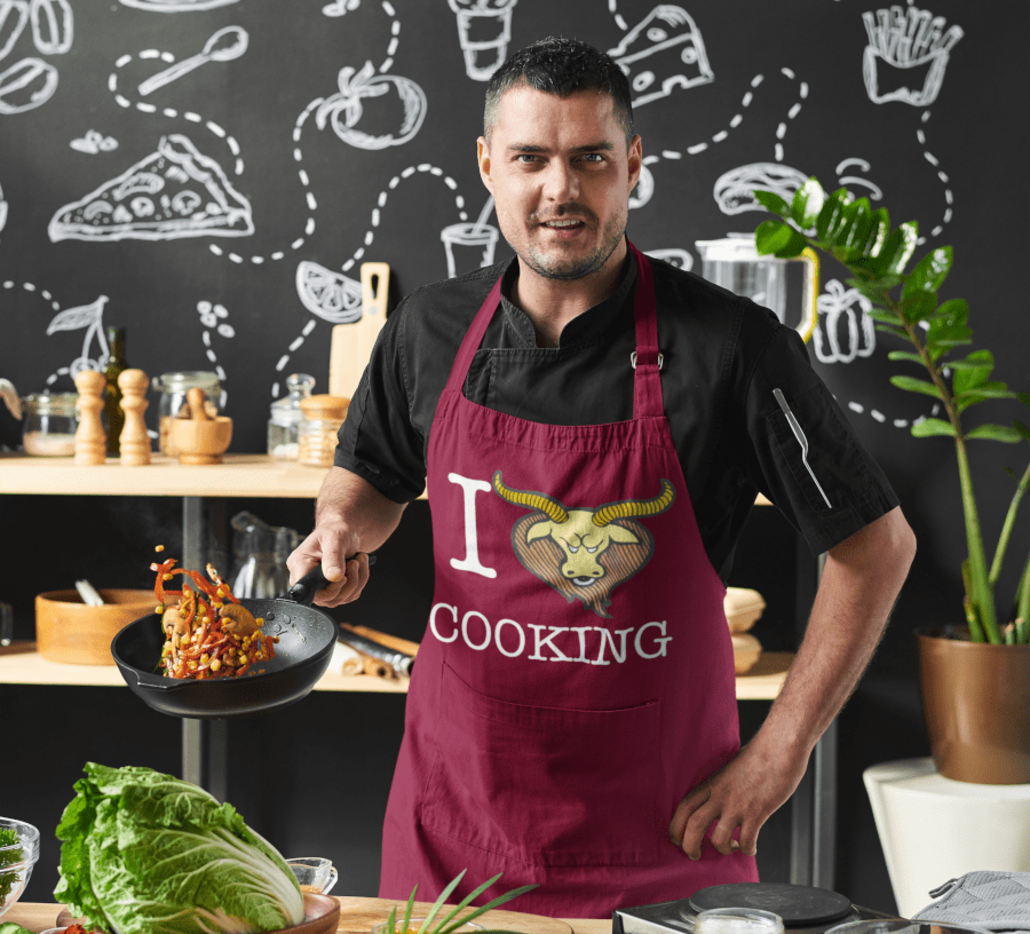 man with customized cooking apron