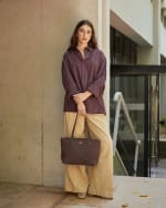 Bolso shopper de nylon con asa bandolera extraíble por 20€