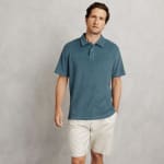 Polo manches courtes uni matière éponge - Bleu à 13€
