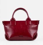 Bolso de mano en color rojo con acabado efecto piel por 9.99€