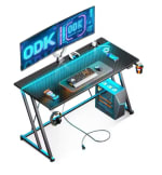 Mesa gaming de 120 × 50 cm con luces LED y toma de corriente por 55,37€