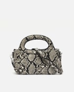 Bolso de fiesta animal print con asa bandolera extraíble por 9€