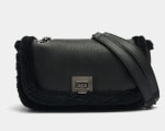 Parfois Bolso de fiesta efecto pelo por 7.99€.