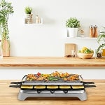 Appareil à raclette & Pierrade Tefal, Fonte parfaite du fromage à 69,99€