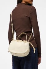 Bolso bombonera teddy detalles piel Pieces por 15.39€