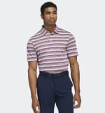 Polo de golf Adidas a rayas blanco y burdeos por 14,99€