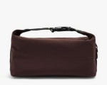 Parfois Neceser liso de nylon por 9.99€.
