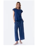 Pantalón largo fluido liso de mujer TEX por 7.99€.